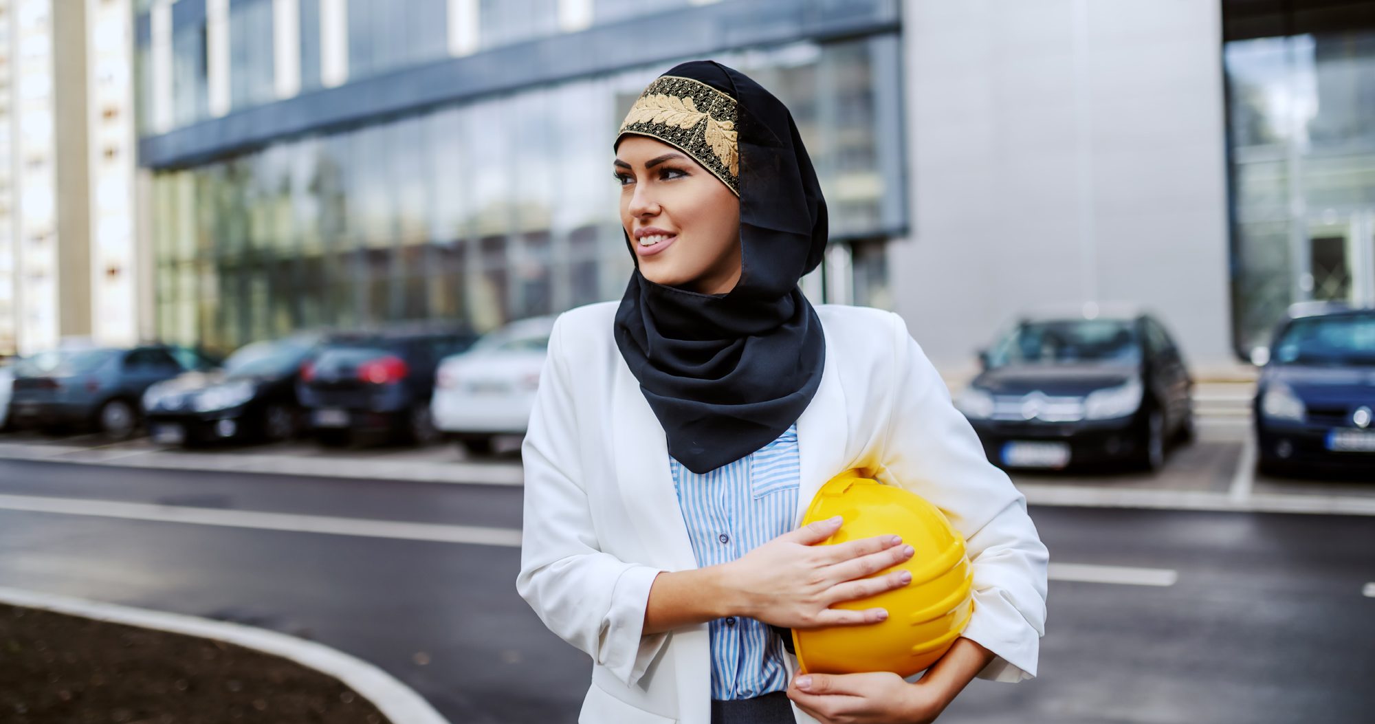 Arabic Young Woman With Hardhat Being Carried Aspect Ratio 760 400