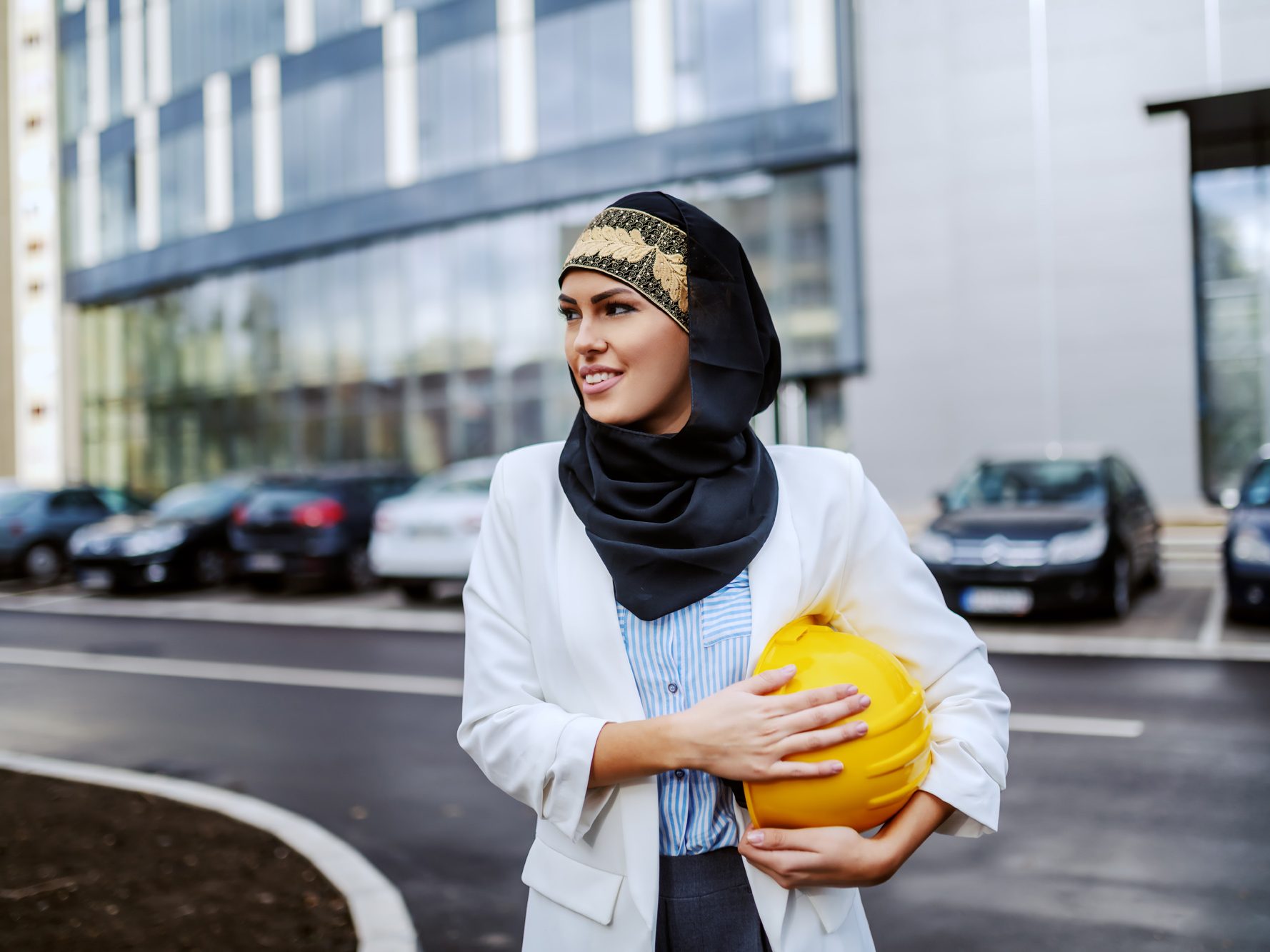 Arabic Young Woman With Hardhat Being Carried Aspect Ratio 800 600