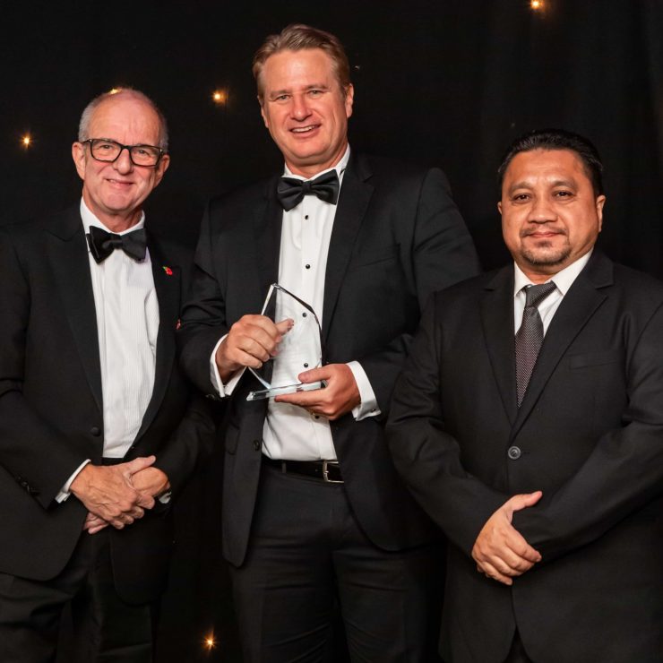 Michael Krumpelman And Ahmad Hafeez Ramli Centre From BJ Services Receive Their Award From ECITB CEO Andrew Hockey And Event Host Kate Bellingham Scaled 1 Aspect Ratio 740 740